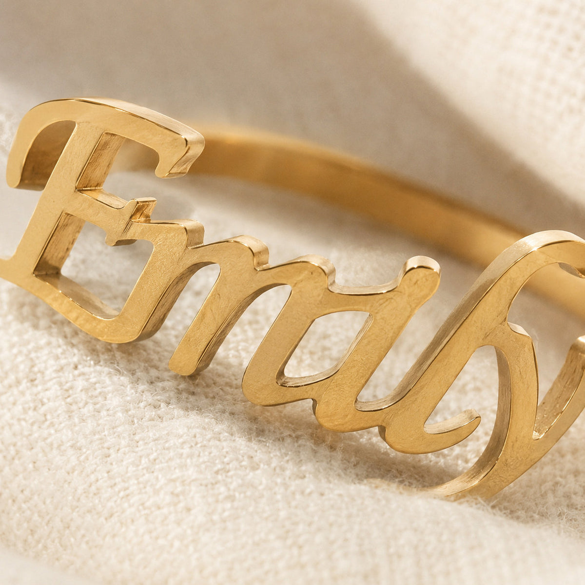 Close-up of custom name lettering on ring