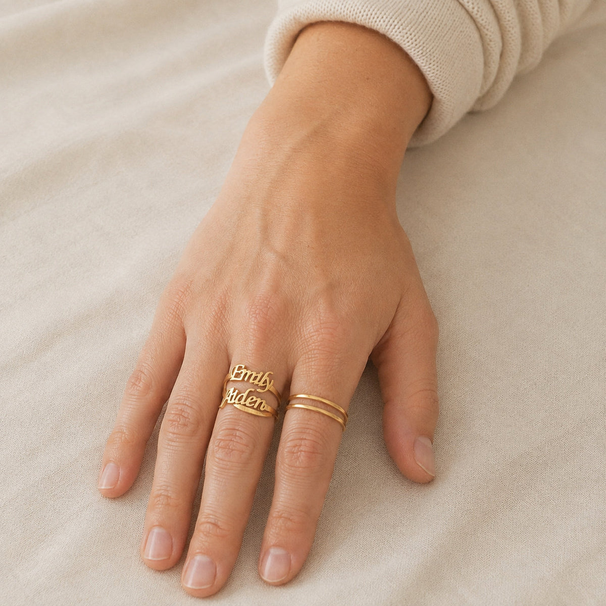 Customized Name Ring worn on hand, close-up