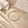 Morse Code Bracelet laid flat on cloth
