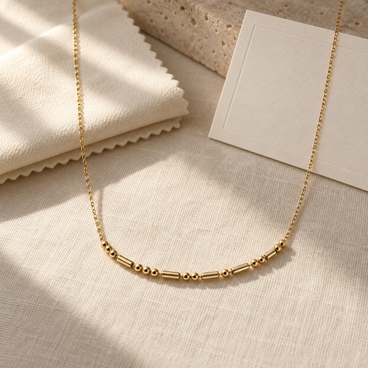 Morse Code Necklace laid flat on card