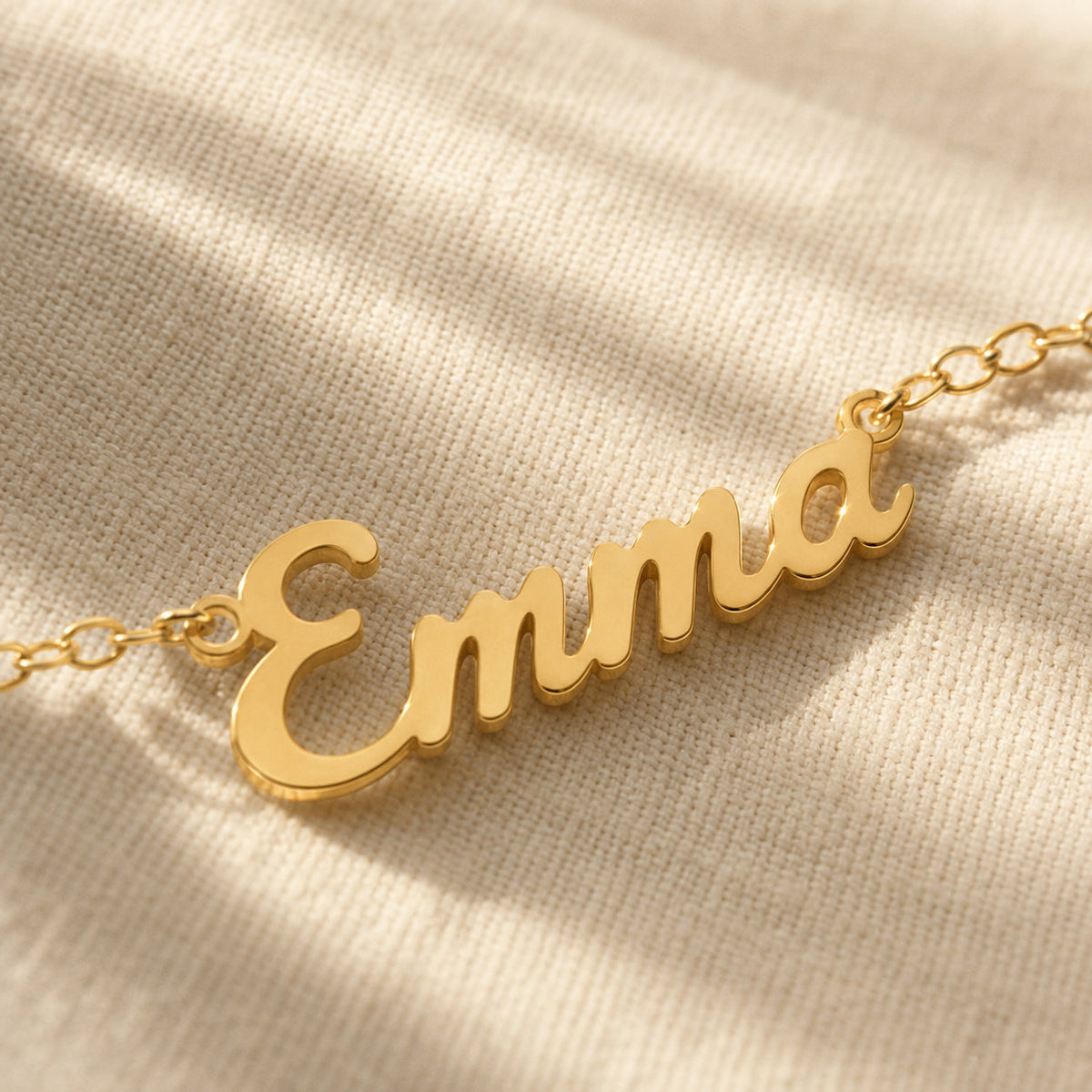 Close-up of custom name lettering on necklace