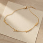 Personalized Name Necklace laid flat on card